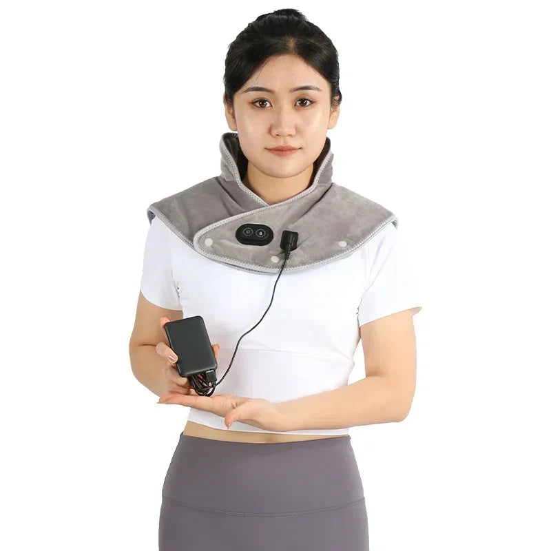 "Aura Thermo Neck & Shoulder Massager - Model wearing massager"
